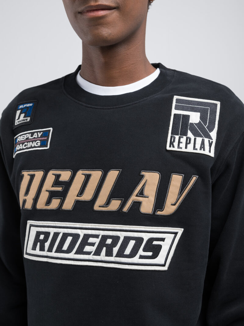 black sweatshirt with patch and lettering