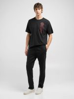 black jersey t shirt with multi coloured print (copy)