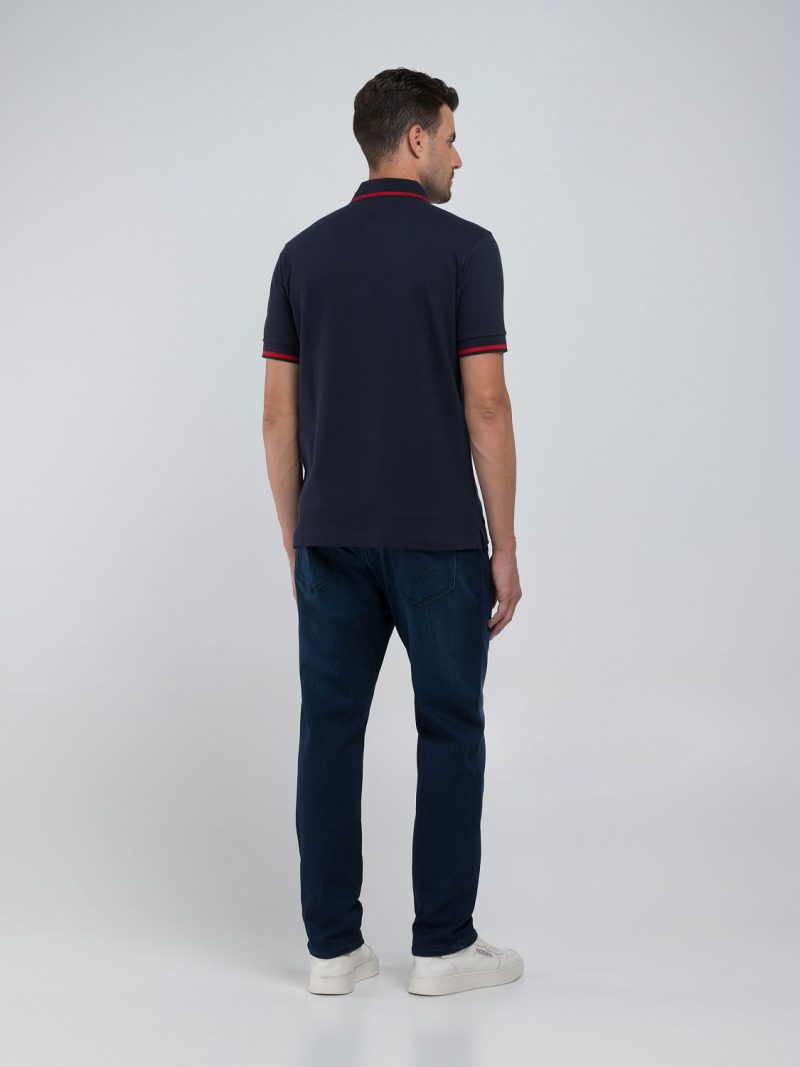 navy polo shirt with red detail
