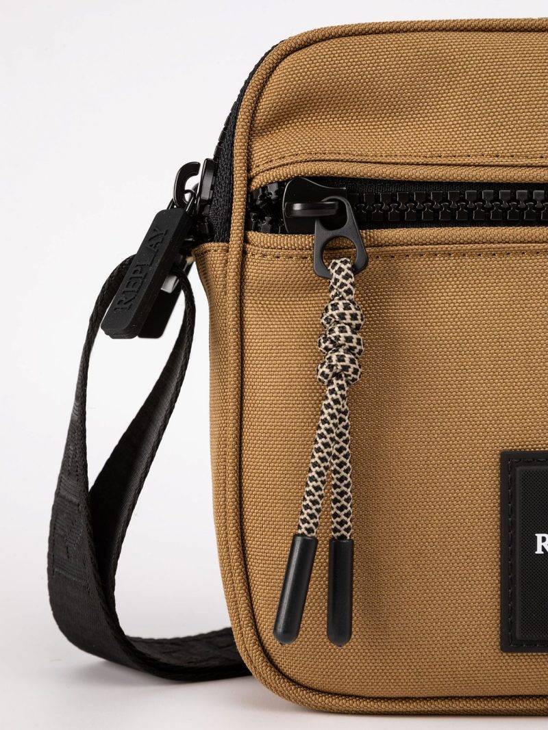 bag with ag with branded shoulder strap