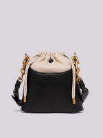 black and nude bucket bag with laces