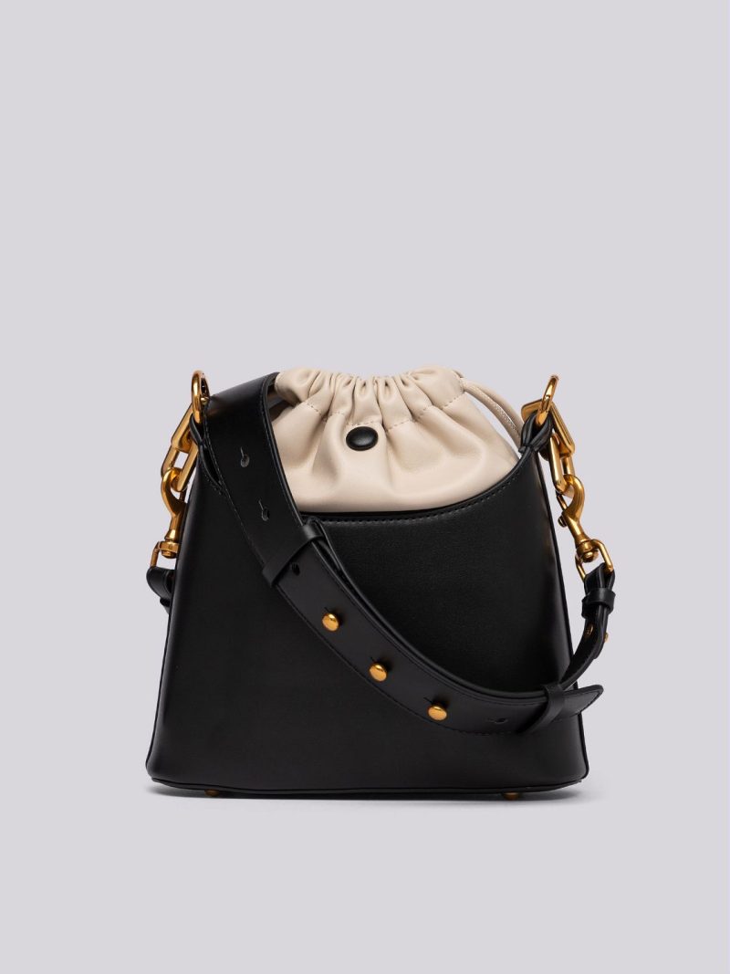 black and nude bucket bag with laces